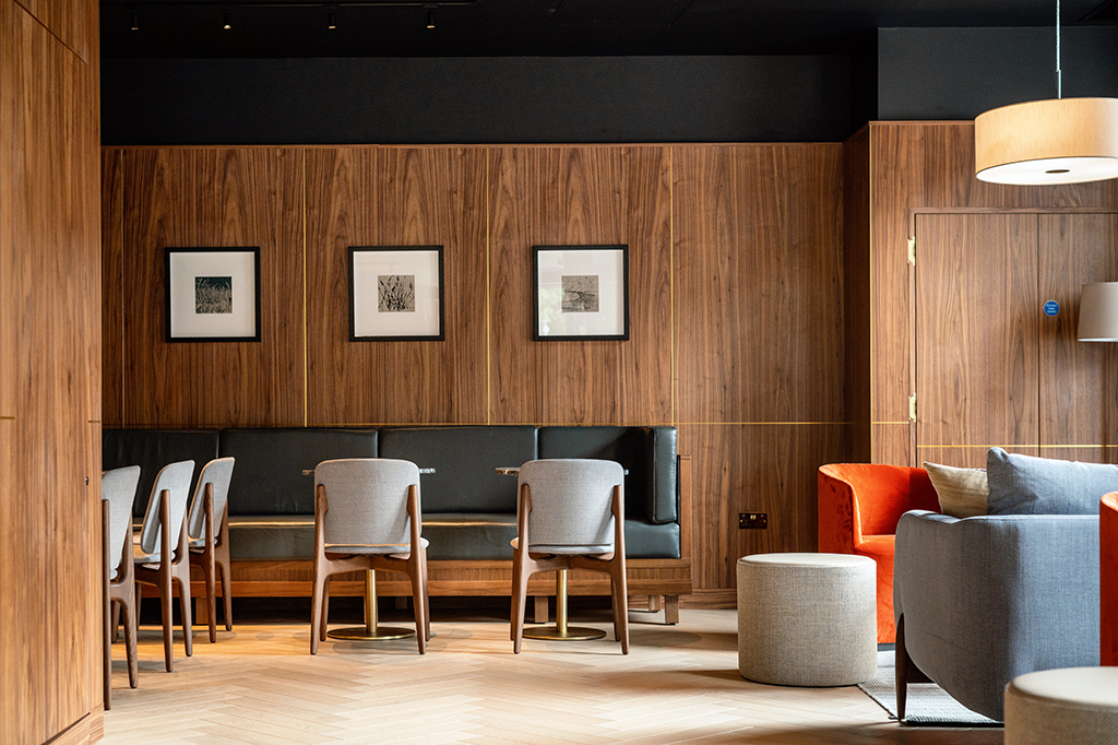 Lounge area with booths and arm chairs